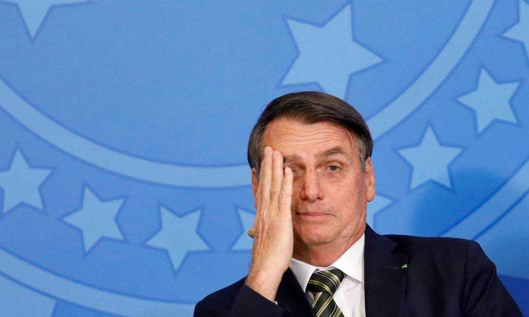x83903343_Brazils-President-Jair-Bolsonaro-reacts-during-a-review-and-modernization-ceremony-of-occu.jpg.pagespeed.ic.P-nuo18gIR
